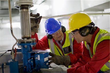 Workers doing maintenance works Stock Photo - Premium Royalty-Free, Code: 649-03796343