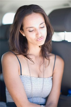 simsearch:649-06533100,k - Offended young woman sitting in car Stock Photo - Premium Royalty-Free, Code: 649-03796415