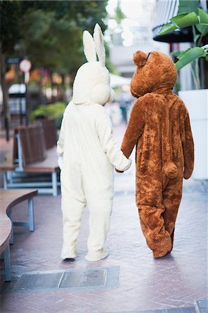 friends sidewalk walk - Bunny and bear going along the street Stock Photo - Premium Royalty-Free, Code: 649-03796537