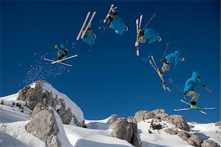 someone flipping in mid air - Skier doing dangerous free ride jump Stock Photo - Premium Royalty-Free, Code: 649-03817446