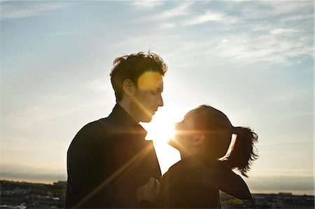 romance roof top - Looking each other deep in the eyes Stock Photo - Premium Royalty-Free, Code: 649-03817559