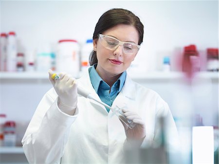 experiment - Scientist performing test in lab Stock Photo - Premium Royalty-Free, Code: 649-03817855