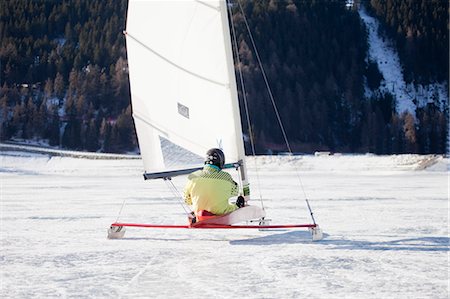 senior citizen snow - Ice salior sledding across frozen lake Stock Photo - Premium Royalty-Free, Code: 649-03818076