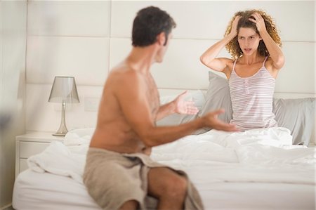 relationship problem - Couple arguing in bedroom Stock Photo - Premium Royalty-Free, Code: 649-03857224