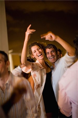 social dance - Couple dancing at party at night Foto de stock - Sin royalties Premium, Código: 649-03857302