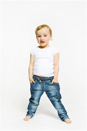 funky - Toddler girl with hands in pockets Foto de stock - Sin royalties Premium, Código: 649-03857893