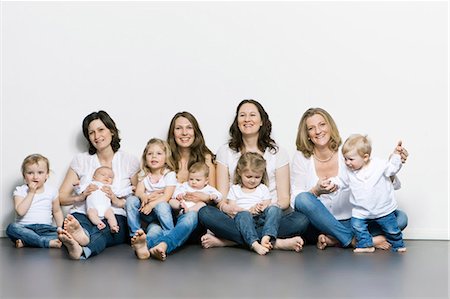 family studio shot - Mothers and children sitting together Stock Photo - Premium Royalty-Free, Code: 649-03857901