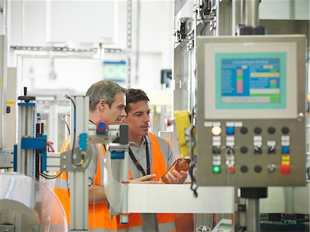 Factory workers in bottling plant Stock Photo - Premium Royalty-Free, Code: 649-03858205