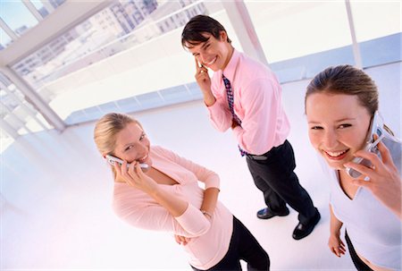 simsearch:649-06400445,k - Business people talking on cell phones Stock Photo - Premium Royalty-Free, Code: 649-03858626