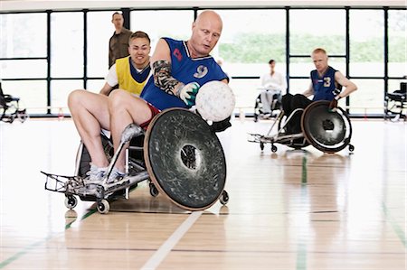 female paraplegic - Para rugby players playing rugby Stock Photo - Premium Royalty-Free, Code: 649-03884384