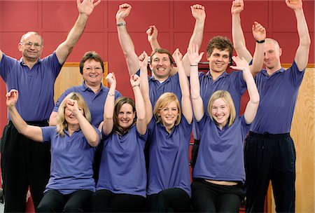 simsearch:649-05520720,k - Team of trainers cheering at gym Stock Photo - Premium Royalty-Free, Code: 649-03881966