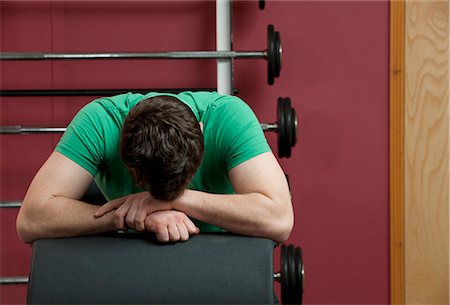 exhausted gym - Man resting in gym Stock Photo - Premium Royalty-Free, Code: 649-03881994