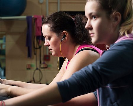 fitness mother - Women exercising in gym Stock Photo - Premium Royalty-Free, Code: 649-03882009