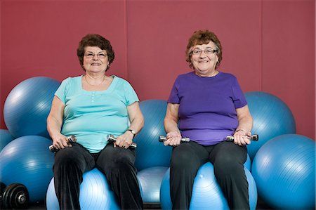 senior at gym - Older women lifting weights in gym Stock Photo - Premium Royalty-Free, Code: 649-03882020