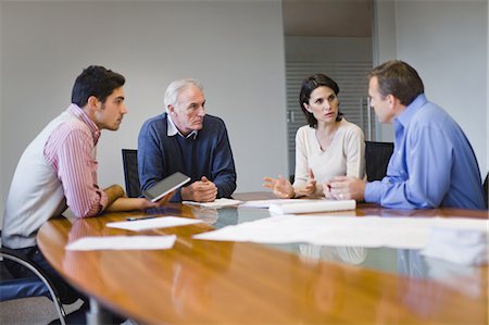 Business people talking in meeting Stock Photo - Premium Royalty-Free, Code: 649-03882437