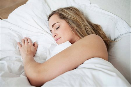 simsearch:649-03566257,k - Woman asleep in bed Stock Photo - Premium Royalty-Free, Code: 649-03882661