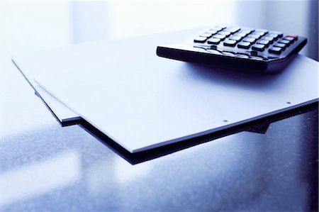 simsearch:693-06325170,k - Papers and calculator on office desk Stock Photo - Premium Royalty-Free, Code: 649-03883575