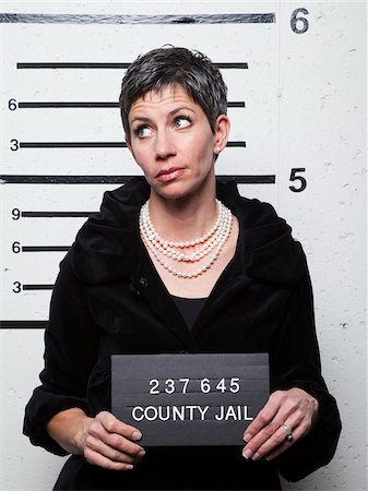 prison photograph - Studio mugshot of mature woman Foto de stock - Sin royalties Premium, Código: 640-05760908