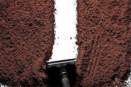 Razor plowing through ground coffee Foto de stock - Sin royalties Premium, Código: 640-05760955