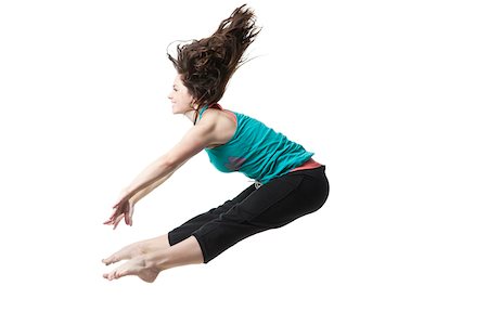 Femme sautant avec bras tendus Photographie de stock - Premium Libres de Droits, Code: 640-05761021
