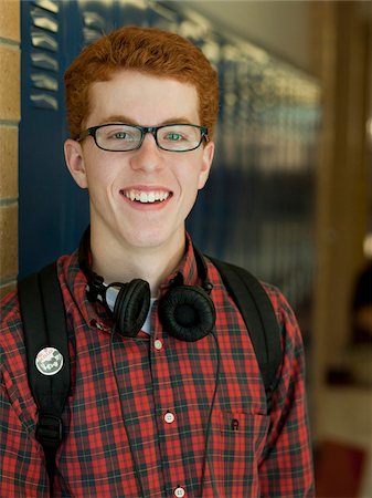 USA, Utah, Portrait of teenage boy (16-17) in school corridor Stock Photo - Premium Royalty-Free, Code: 640-05761051