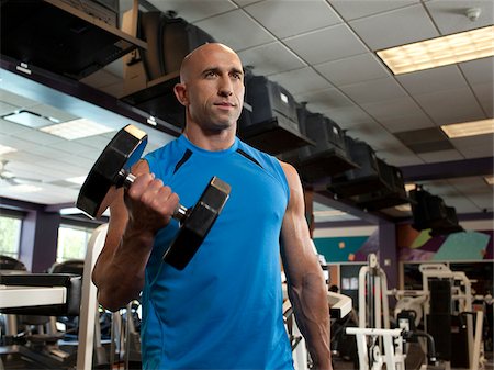 déraper - USA, Utah, Draper, Man exercising in gym Stock Photo - Premium Royalty-Free, Code: 640-05761119