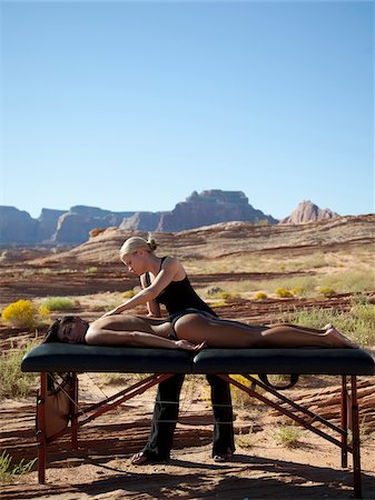 persian ethnicity - USA, Utah, Lake Powell, Woman receiving massage Stock Photo - Premium Royalty-Free, Code: 640-05761155