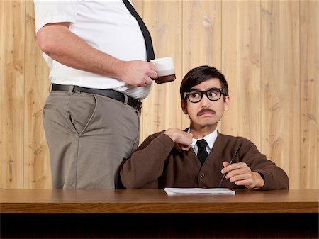 petrified - Boss by stressed businessman at desk in office Foto de stock - Sin royalties Premium, Código: 640-05761200