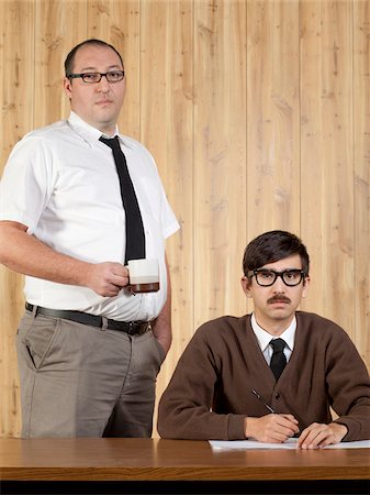 dorky businessman - Portrait of two businessmen working in office Stock Photo - Premium Royalty-Free, Code: 640-05761201
