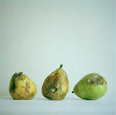 decaying - Three old pears, studio shot Stock Photo - Premium Royalty-Free, Code: 640-05761376