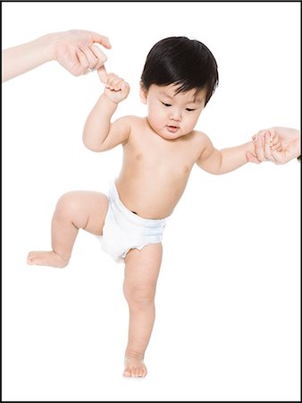 baby's first steps Stock Photo - Premium Royalty-Free, Code: 640-06049788