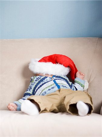 baby with a santa claus hat on Stock Photo - Premium Royalty-Free, Code: 640-06049814