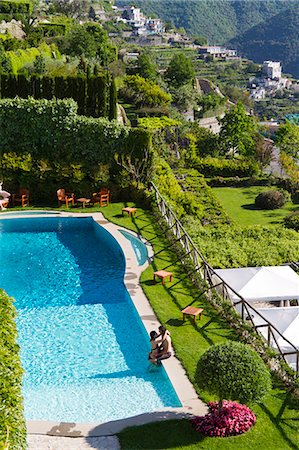 swimming pool pictures with mountains - Italy, Ravello, Terrace with outdoor pool and couple kissing Stock Photo - Premium Royalty-Free, Code: 640-06049873