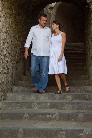 simsearch:640-06050121,k - Italy, Ravello, Couple walking on stairs Stock Photo - Premium Royalty-Free, Code: 640-06050046