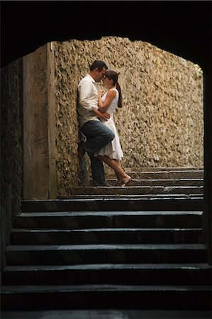 romantic couple silhouette - Italy, Ravello, Mature couple kissing in archway Stock Photo - Premium Royalty-Free, Code: 640-06050100