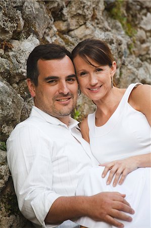 simsearch:640-06050138,k - Italy, Ravello, Mature couple embracing against stone wall Stock Photo - Premium Royalty-Free, Code: 640-06050110