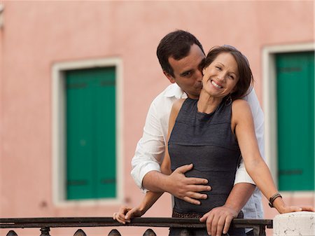 simsearch:640-06050091,k - Italy, Venice, Mature couple embracing on bridge Stock Photo - Premium Royalty-Free, Code: 640-06050203