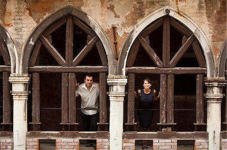 simsearch:640-06049845,k - Italy, Venice, Couple standing in arcade Stock Photo - Premium Royalty-Free, Code: 640-06050336