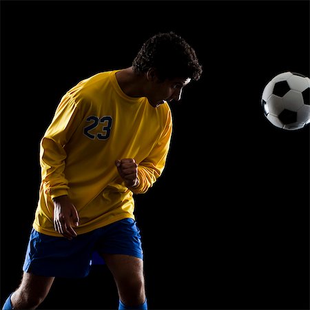 soccer player heading the ball Stock Photo - Premium Royalty-Free, Code: 640-06050644