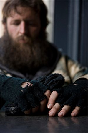 USA, Utah, Salt Lake City, Man in winter clothing, focus on hands in foreground Stock Photo - Premium Royalty-Free, Code: 640-06050716