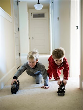 two boys playing wth toys Stock Photo - Premium Royalty-Free, Code: 640-06050938