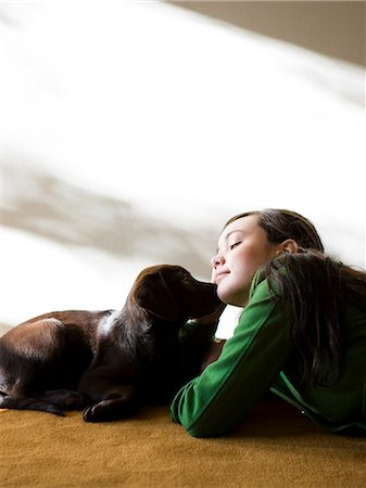 simsearch:640-02658715,k - young woman with a brown puppy Stock Photo - Premium Royalty-Free, Code: 640-06051036