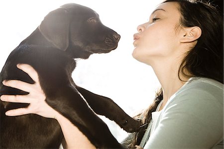 simsearch:640-02658715,k - young woman with a brown puppy Stock Photo - Premium Royalty-Free, Code: 640-06051030