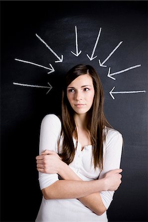 self image - young woman against a chalkboard Stock Photo - Premium Royalty-Free, Code: 640-06051061