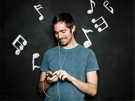 man against a chalkboard Stock Photo - Premium Royalty-Free, Code: 640-06051119