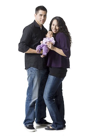 family studio shot - parents and baby Stock Photo - Premium Royalty-Free, Code: 640-06051112
