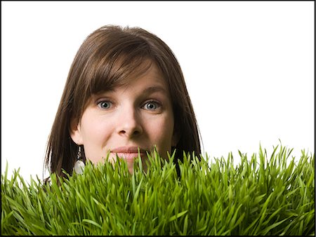 simsearch:640-06051229,k - woman's head in the grass Foto de stock - Royalty Free Premium, Número: 640-06051178