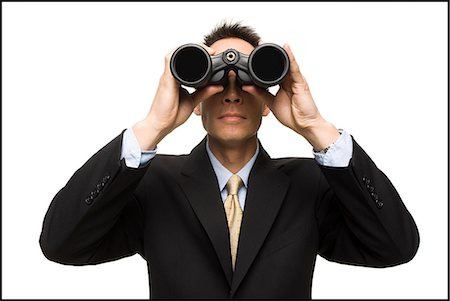 businessperson with binoculars Stock Photo - Premium Royalty-Free, Code: 640-06051179