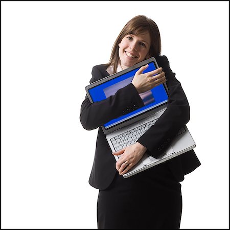 simsearch:640-06051229,k - businessperson holding a laptop computer Foto de stock - Royalty Free Premium, Número: 640-06051185