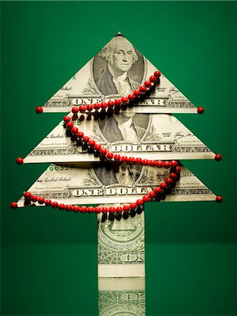 christmas tree made of money Stock Photo - Premium Royalty-Free, Code: 640-06051255